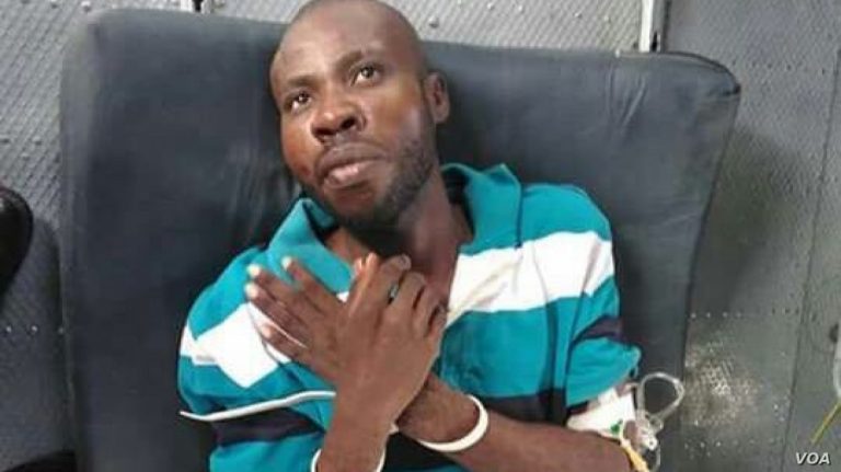 Arnel Joseph après son arrestation Photo VOA