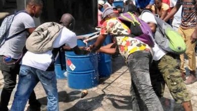 Haiti.workers sanitizing hands.COVID .3.20.Reginald Lafontant 1 615x310 credit Solidarity Center 1